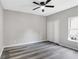 Bedroom featuring a closet, window, and luxury vinyl plank flooring at 381 New Jersey Ave Nw, Atlanta, GA 30314