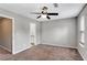 Bedroom with carpet, ceiling fan, and ensuite bathroom at 381 New Jersey Ave Nw, Atlanta, GA 30314