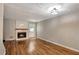 Bright living room with a decorative fireplace and hardwood flooring at 381 New Jersey Ave Nw, Atlanta, GA 30314