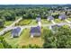 Neighborhood aerial view of single-Gathering homes with a backdrop of lush green trees at 4323 Cannon Walk, Ellenwood, GA 30294