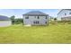 Spacious backyard featuring a lush green lawn, perfect for outdoor activities and relaxation at 4323 Cannon Walk, Ellenwood, GA 30294