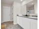 Bathroom featuring double sinks, counter space, and walk-in shower at 4323 Cannon Walk, Ellenwood, GA 30294