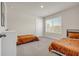 Cozy bedroom with carpet flooring and natural lighting at 4323 Cannon Walk, Ellenwood, GA 30294