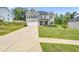 Charming two-story brick home with a well-manicured lawn and a two-car garage at 4323 Cannon Walk, Ellenwood, GA 30294