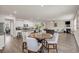 Open-concept living space featuring a modern kitchen, dining area, and a cozy living room at 4323 Cannon Walk, Ellenwood, GA 30294