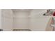 Large walk-in closet with ample shelving for organized storage at 4323 Cannon Walk, Ellenwood, GA 30294