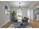 Dining room features hardwood floors with an area rug at 52 Sutton Pl, Avondale Estates, GA 30002