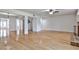 Open living room with hardwood floors flows into other living areas at 52 Sutton Pl, Avondale Estates, GA 30002
