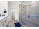 Contemporary bathroom showcasing a glass enclosed shower and modern finishes at 779 Keystone Dr, Woodstock, GA 30188