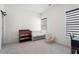 Bright Bedroom with a crib, changing table, and natural light from large windows at 779 Keystone Dr, Woodstock, GA 30188
