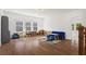 Spacious and bright bonus room offering hardwood floors and ample natural light at 779 Keystone Dr, Woodstock, GA 30188