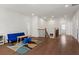 Upstairs bonus room boasts hardwood floors, natural light, and an open floor plan at 779 Keystone Dr, Woodstock, GA 30188