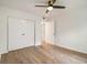 Bedroom featuring wood floors, a closet and an open doorway at 1150 Collier Nw Rd # A1, Atlanta, GA 30318