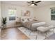 Comfortable bedroom with large windows and hardwood floors at 1150 Collier Nw Rd # A1, Atlanta, GA 30318