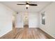 Bedroom with hardwood floors, ceiling fan, and access to bathroom at 1150 Collier Nw Rd # A1, Atlanta, GA 30318