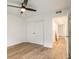 Bedroom featuring wood floors, a closet and an entrance to a hallway at 1150 Collier Nw Rd # A1, Atlanta, GA 30318