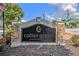 Elegant stone and stucco sign for Collier Green Condominiums with manicured landscaping at 1150 Collier Nw Rd # A1, Atlanta, GA 30318