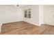 Open-concept dining room with beautiful hardwood floors and natural light at 1150 Collier Nw Rd # A1, Atlanta, GA 30318