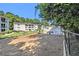 Outdoor fenced dog park with benches and a grassy area for residents and pets to enjoy together at 1150 Collier Nw Rd # A1, Atlanta, GA 30318