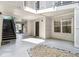 Apartment building exterior shows entrance to unit with stairs at 1150 Collier Nw Rd # A1, Atlanta, GA 30318