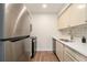 Efficient kitchen features stainless steel appliances and sleek countertops at 1150 Collier Nw Rd # A1, Atlanta, GA 30318
