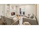 Inviting living room featuring a cozy fireplace and bright french doors at 1150 Collier Nw Rd # A1, Atlanta, GA 30318