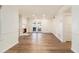 Elegant living room with beautiful hardwood flooring, built-in shelving and a fireplace at 1150 Collier Nw Rd # A1, Atlanta, GA 30318