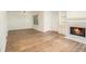 Spacious living room with fireplace and hardwood floors at 1150 Collier Nw Rd # A1, Atlanta, GA 30318