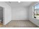 Sunny empty bedroom with ensuite bathroom and neutral carpeting at 5440 Howington Ct # 190, Buford, GA 30518