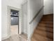 Open stairway with hardwood stairs at 7410 Ansley View Ln, Cumming, GA 30028