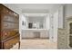 Bathroom vanity with lots of storage and large mirror at 80 Cliffcreek Trce, Atlanta, GA 30350