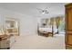 Spacious bedroom with a four-poster bed and views of the backyard at 80 Cliffcreek Trce, Atlanta, GA 30350