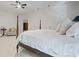 Bright bedroom features a four poster bed and neutral carpet at 80 Cliffcreek Trce, Atlanta, GA 30350