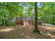 Charming single-story brick home surrounded by lush, mature trees in a peaceful setting at 80 Cliffcreek Trce, Atlanta, GA 30350