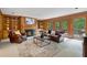 Cozy living room with wood paneling and built in shelving at 80 Cliffcreek Trce, Atlanta, GA 30350