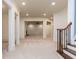 Finished basement rec room featuring neutral colors and bright lighting at 9695 Almaviva Dr, Alpharetta, GA 30022