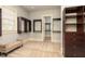 Walk-in closet with custom shelving and storage solutions at 9695 Almaviva Dr, Alpharetta, GA 30022