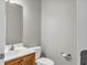 Half bathroom with a light wood vanity and white countertop at 109 Creighton Ln, Marietta, GA 30008