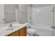 Bright bathroom featuring a vanity, toilet, and shower-tub combination at 109 Creighton Ln, Marietta, GA 30008