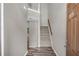 Open foyer with hardwood-style floors and a carpeted staircase at 109 Creighton Ln, Marietta, GA 30008