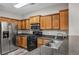 Modern kitchen with stainless steel appliances, granite countertops, and ample cabinet space at 109 Creighton Ln, Marietta, GA 30008