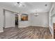 Spacious living room with hardwood floors, open to the kitchen and dining area at 109 Creighton Ln, Marietta, GA 30008