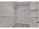 A walk-in closet with wire shelving for storage and gray carpeting at 109 Creighton Ln, Marietta, GA 30008