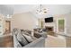 Comfortable living room with vaulted ceiling, fireplace, and access to the outside at 2355 Woodland Hills Dr, Cumming, GA 30040