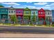 Charming colorful townhomes featuring unique architectural details, balconies, and well-maintained landscaping at 2022 Bixby Byway Se Rd, Atlanta, GA 30317