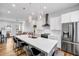 Bright, spacious kitchen with a large island, stainless steel appliances, and an open view into the living area at 2022 Bixby Byway Se Rd, Atlanta, GA 30317