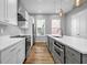Modern kitchen featuring stainless steel appliances, ample counter space, and pendant lighting at 2022 Bixby Byway Se Rd, Atlanta, GA 30317
