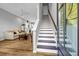 Inviting living room with hardwood floors, staircase, and an open floor plan at 2022 Bixby Byway Se Rd, Atlanta, GA 30317