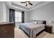 Spacious main bedroom featuring a tray ceiling, neutral paint, and lots of natural light at 2022 Bixby Byway Se Rd, Atlanta, GA 30317