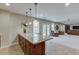 Basement featuring kitchenette, French doors, plush carpet and plenty of sunlight at 457 Skiles Ct, Suwanee, GA 30024